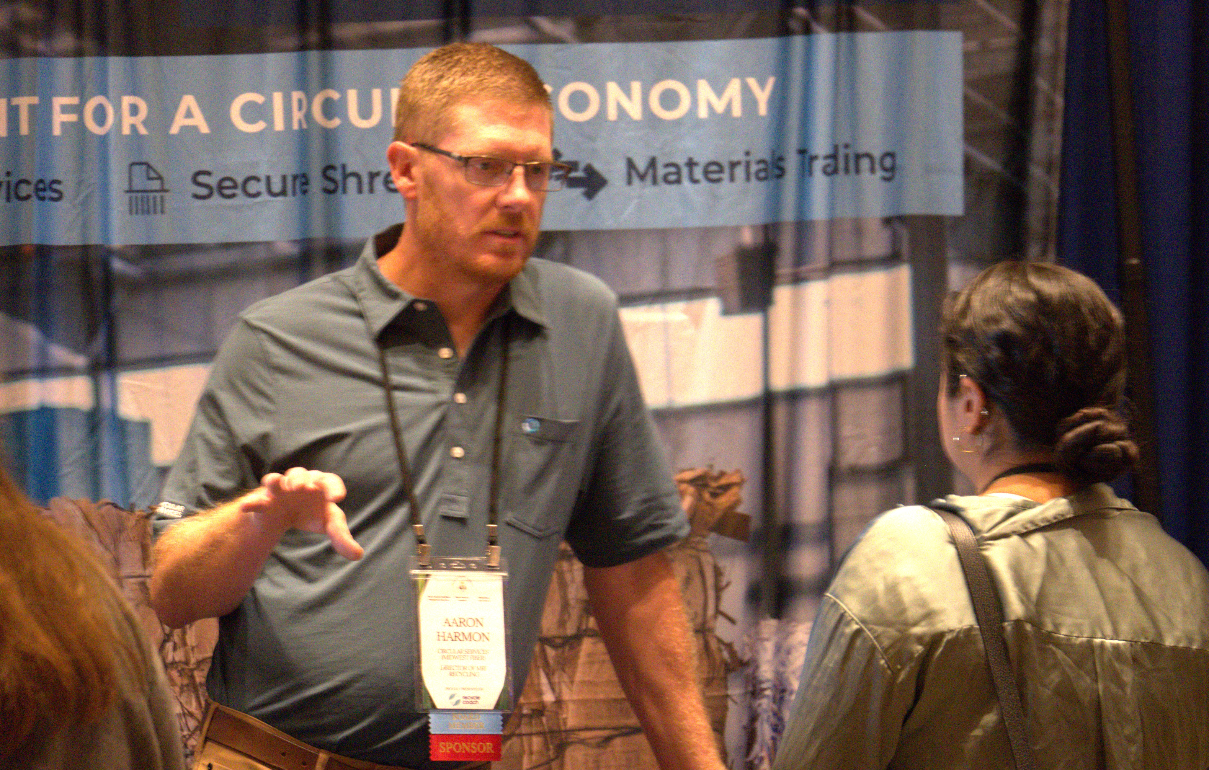 Aaron Harmon at Midwest Fiber booth